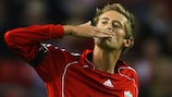 Peter Crouch blows a kiss to the crowd after scoring