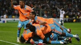 Djibril Cissé is mobbed after scoring Marseille's second