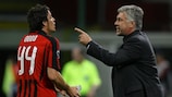 Massimo Oddo takes orders from Milan coach Carlo Ancelotti