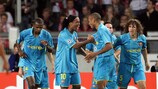 Ronaldinho, Thierry Henry and Puyol show their joy at the third-mentioned's goal