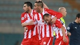 Olympiacos players celebrate their win in Rome