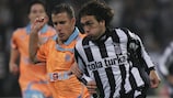 Marseille midfielder Benoît Cheyrou vies with Matías Delgado of Beşiktaş