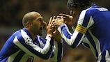 Lisandro López and Lucho González celebrate Porto's equaliser