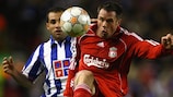Jamie Carragher in action against Porto