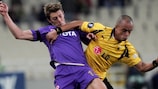 Fiorentina's Federico Balzaretti (left) deflected in a shot by AEK's Júlio César (right)