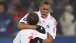 Hamburg goalscorer Ivica Olić celebrates with Jerome Boateng