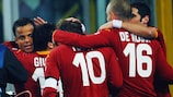 Roma celebrate Mancini's winning goal