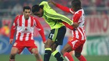 Chelsea striker Didier Drogba attempts to wriggle free