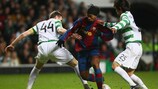 Stephen McManus (left) tries to get to grips with Ronaldinho