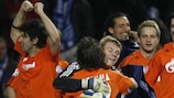 Manuel Neuer (centre) is hugged after his saves helped Schalke overcome Porto