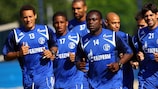 Schalke, including new signing Jefferson Farfán (No17), limber up