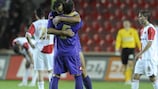 Fiorentina's Alessandro Gamberini and Dario Dainelli embrace after sealing qualification