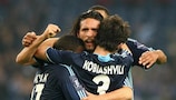 Kevin Kuranyi is swamped by Schalke team-mates after making it 2-0