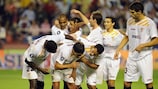 After taking a knock as he scored, Renato (second from left) catches his breath as his team-mates celebrate