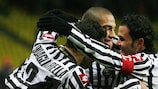 Udinese's Fabio Quagliarella (left) is congratulated by team-mates after finding the net in Moscow