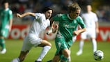 Bremen defender Clemens Fritz takes the ball away from Hawar Taher