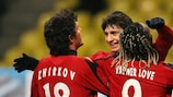 Alan Dzagoev (centre) celebrates his opening goal with Yuri Zhirkov and Vágner Love