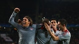 Ryan Babel, Lucas, Robbie Keane and Álvaro Arbeloa celebrate Liverpool's success