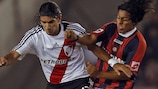 Walter Aníbal Acevedo (right) in action for San Lorenzo