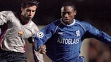 Celestine Babayaro (right) takes on Luís Figo during Chelsea's 2000 quarter-final meeting with FC Barcelona