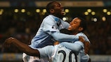 Felipe Caicedo (centre) is mobbed by Shaun Wright-Phillips (left) and Robinho after scoring the opening goal