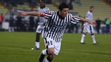 Antonio Di Natale wheels away after doubling Udinese's lead