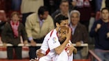 Frédéric Kanouté is hugged by team-mate Jesús Navas