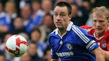John Terry breaks away from Liverpool's Dirk Kuyt in a league meeting this season