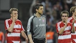 Bayern players leave the field following their ultimately fruitless draw against Barcelona