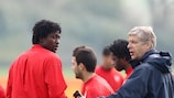 Arsène Wenger and Emmanuel Adebayor in training on Tuesday