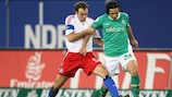 HSV's Joris Mathijsen (left) in action against Bremen last Wednesday