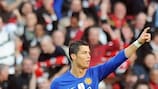 Cristiano Ronaldo salutes the fans after scoring his second and United's third