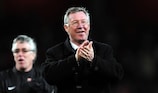 Sir Alex Ferguson salutes the Manchester United fans after his side's victory