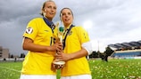 England goalscorers Toni Duggan and Jordan Nobbs pose with the trophy