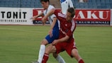 Bakı's Aleksandar Sojic (left) scored their final goal against Ekranas