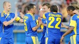 Vitali Rodionov is besieged by team-mates after his goal