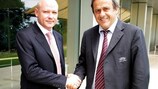 Czech FA President Ivan Hašek shakes hands with UEFA President Michel Platini