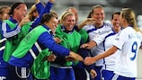 Finland celebrate their first goal by Laura Österberg Kalmari (right)