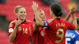Germany's Inka Grings (centre) is congratulated by Kim Kulig and Birgit Prinz after scoring the first goal