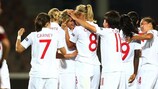 Kelly Smith is mobbed after putting England 3-2 up against Russia