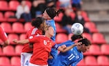 Sandrine Soubeyrand (No6) shows her defensive ability against Iceland