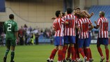 Atlético players celebrate against Panathinaikos