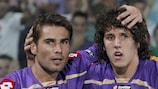 Fiorentina's Stevan Jovetić is congratulated by team-mate Adrian Mutu