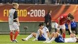 England's Karen Carney comforts distraught Finland players