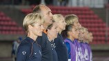 Vera Pauw and the Netherlands bench sing the national anthem before playing France