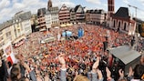 A big crowd in Frankfurt welcomes Germany home with the trophy