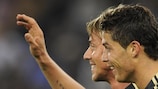 Cristiano Ronaldo celebrates alongside Madrid colleague Guti
