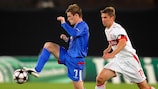 Stuttgart's Thomas Hitzlsperger (right) takes on Rangers midfielder Steven Davis