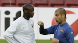Yaya Touré talks with Josep Guardiola at training on Monday