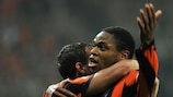 Three goals from Luiz Adriano have helped Shakhtar to the top of Group J
